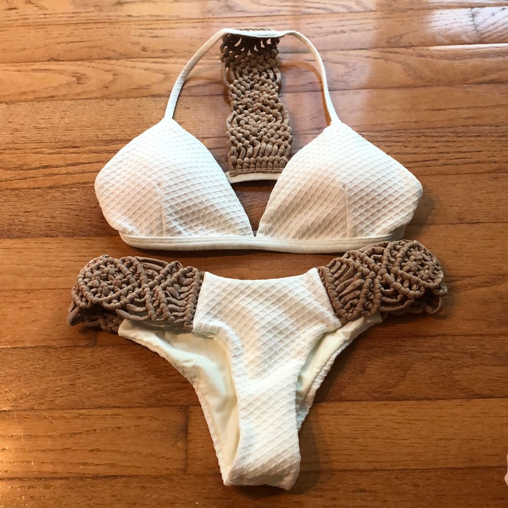 White bikini set with hand braid detail.